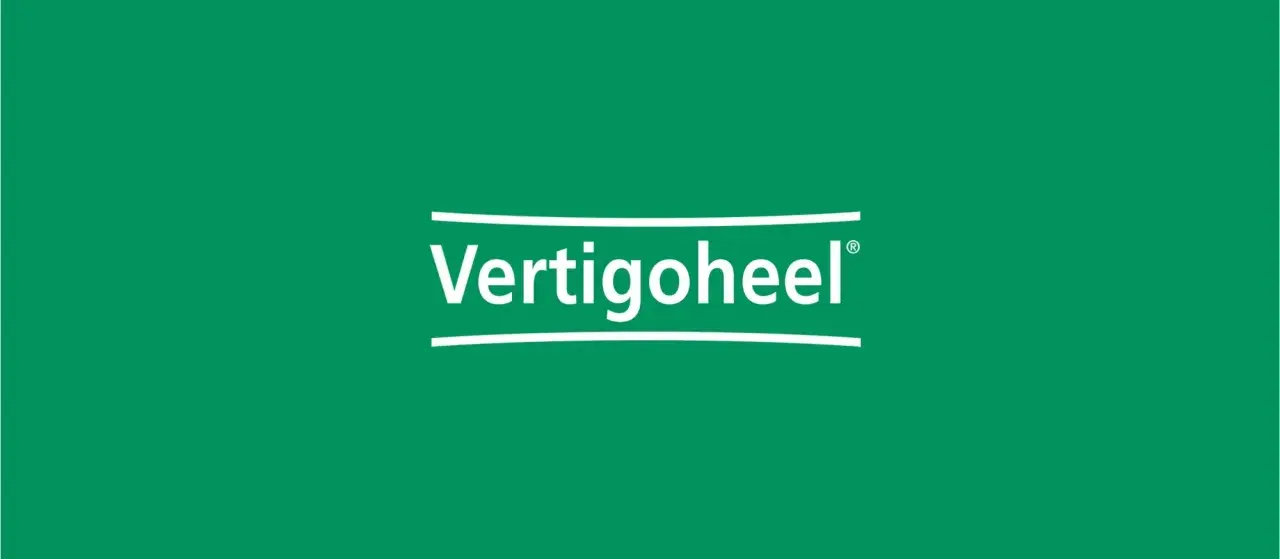Vertigoheel: Wann tritt Wirkung ein? Das Logo zeigt den Namen des Medikaments auf grünem Hintergrund.