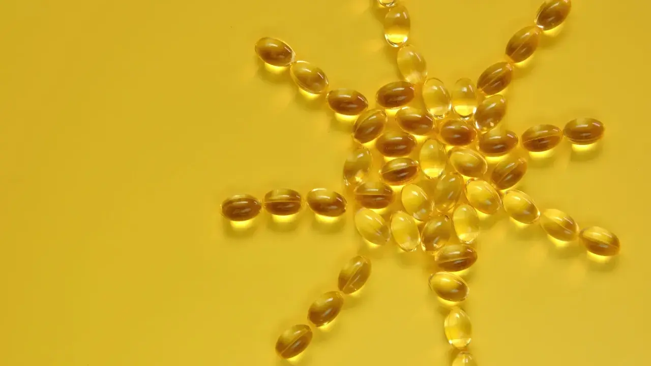 Sonnenförmig angeordnete Kapseln, die an Vitamin D bei MS erinnern.