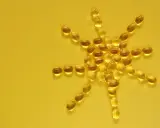 Sonnenförmig angeordnete Kapseln, die an Vitamin D bei MS erinnern.